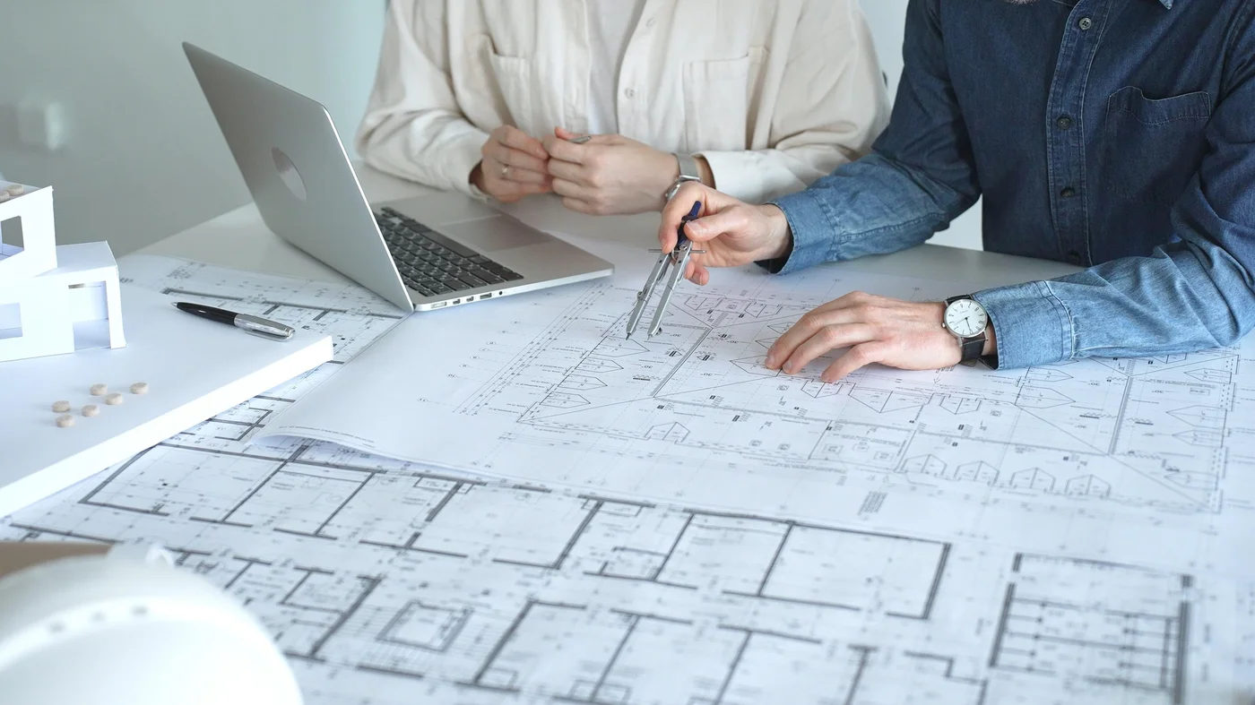 Design team reviewing drawings
